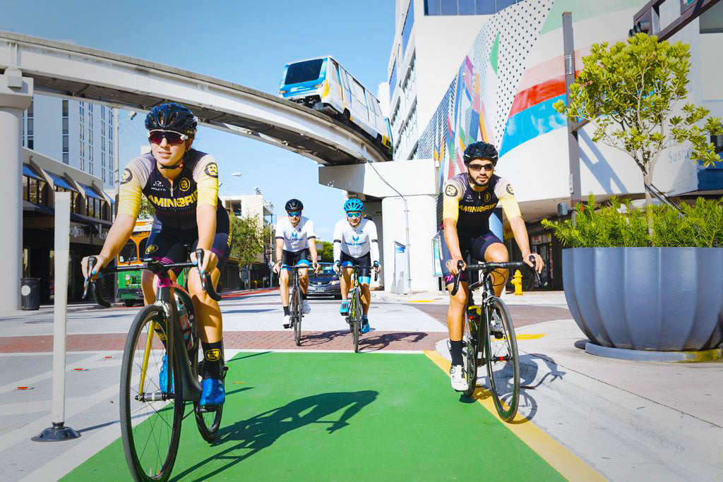 Cyclists in Downtown with the Metromover line in the background
