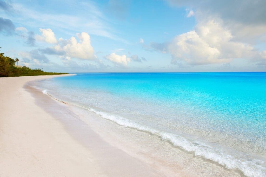 The pristine white sand and crystal-clear turquoise water of Bahia Honda State Park beach in the Florida Keys.
