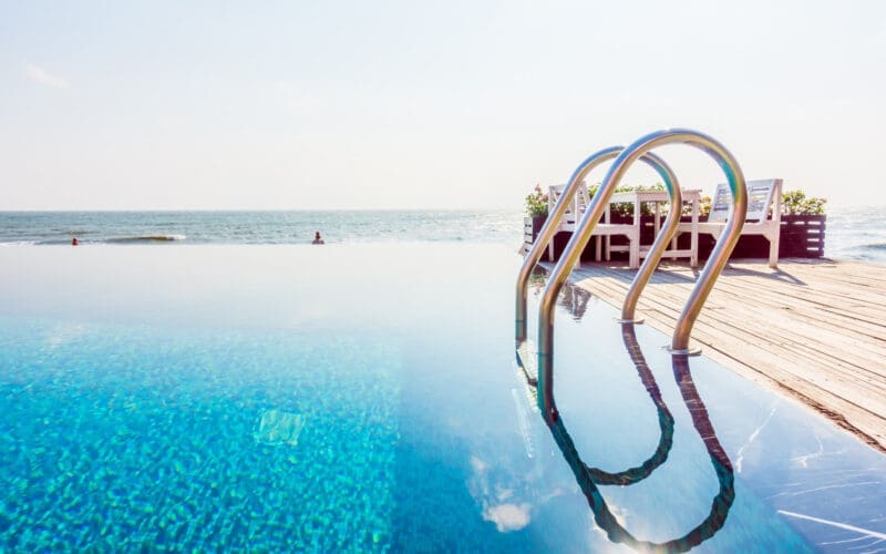 Dive into Elegance: Explore 30 Stunning Swimming Pool Designs to Transform Your Outdoor Oasis