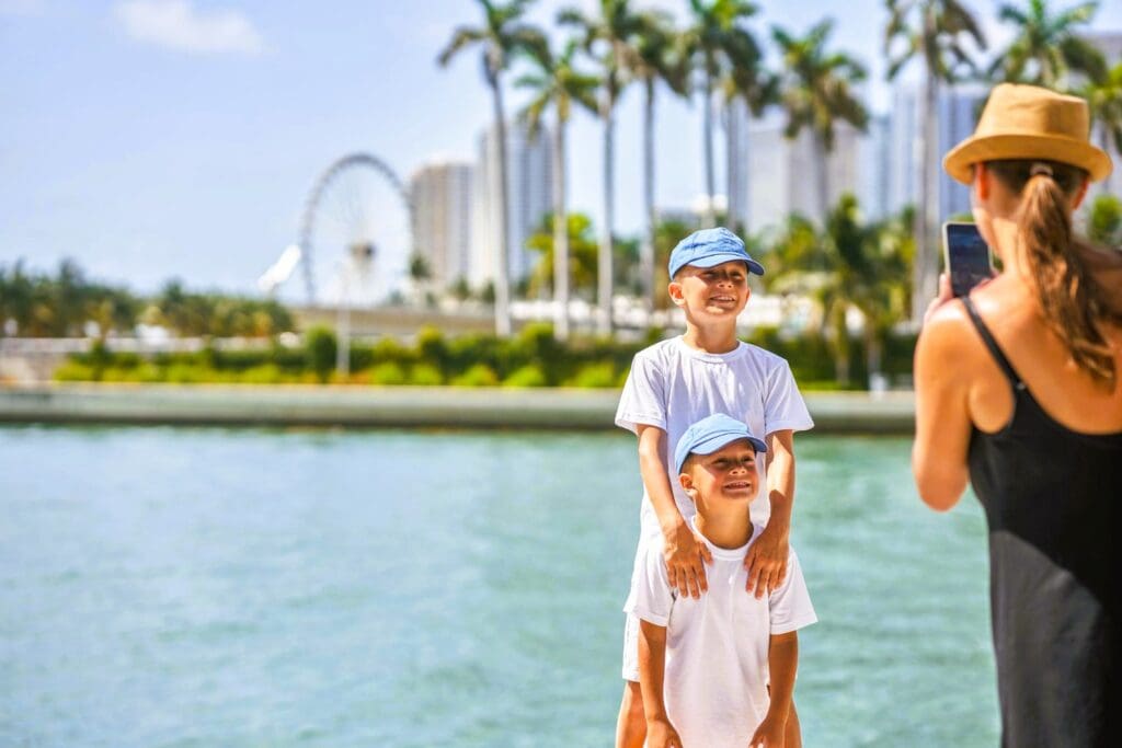 A moment captured in Miami of a mother photographing her sons