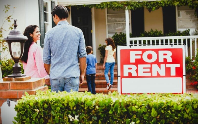 Hispanic family outside home for rent