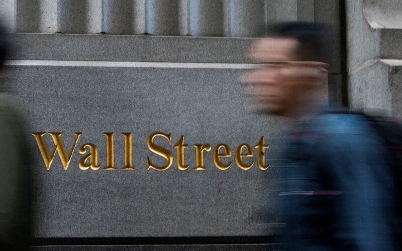 Wall Street ends slightly lower, capping blockbuster year