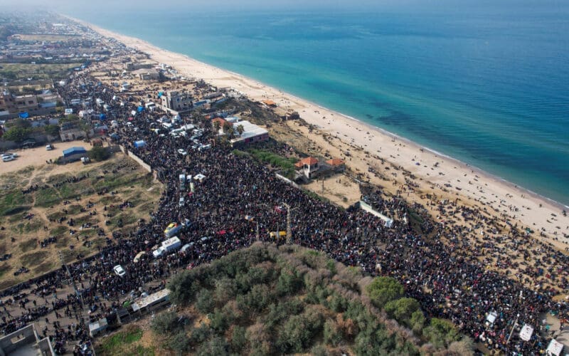 A drone view shows displaced Palestinians waiting to be allowed to return to their homes in northern Gaza, in the central Gaza Strip