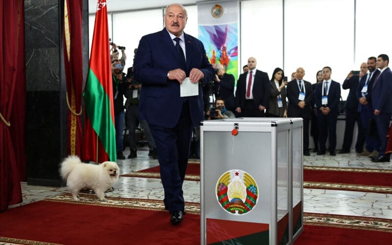 Belarusian President Alexander Lukashenko votes during the presidential election in Minsk