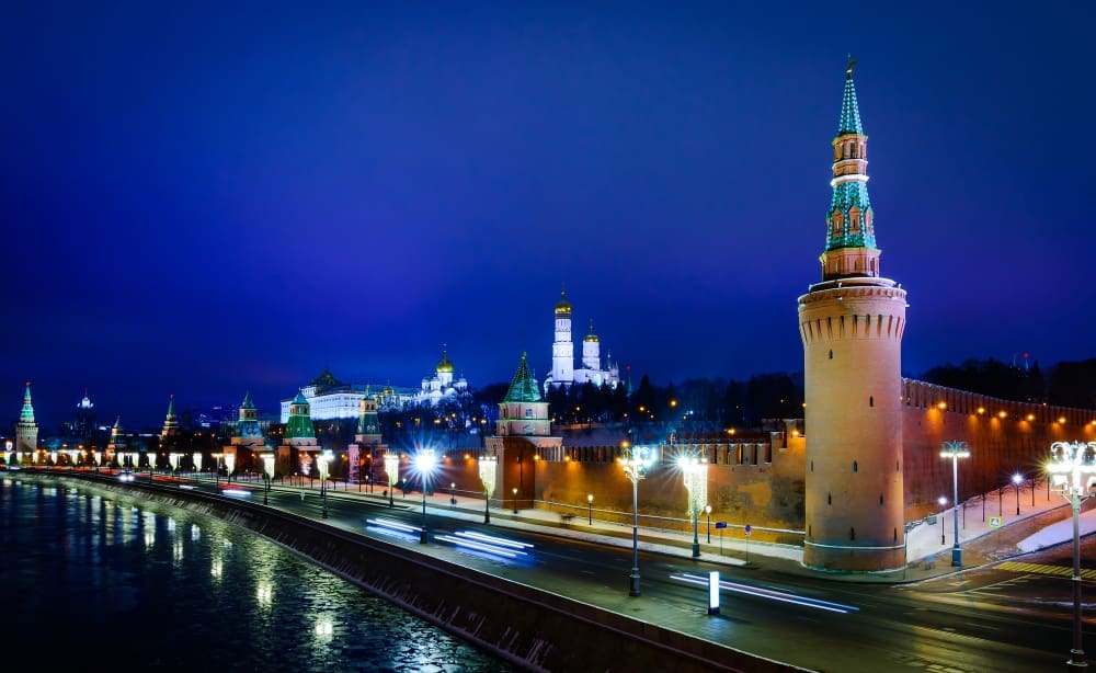 Night view of the Moscow Kremlin and the embankment along the Moskva River in winter, Russia