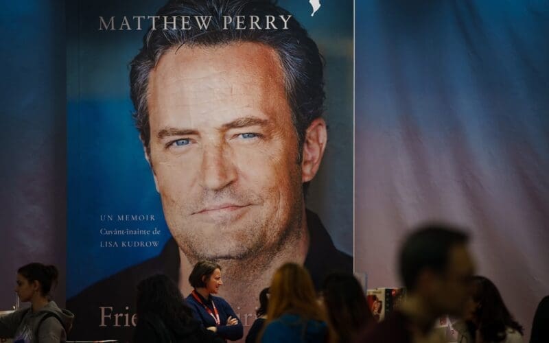 A large banner of Matthew Perry book Friends, Lovers, and the Big Terrible Thing A Memoir at Gaudeamus book fair