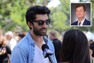 Actor Justin Baldoni talks to a reporter at the “Rocket’s Universe” grand opening, which is the 64th universally accessible playground built by Shane’s Inspiration