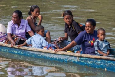 Indigenous migrants are traveling by boat in the Darien Province, Panama, Central America