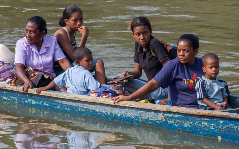 Indigenous migrants are traveling by boat in the Darien Province, Panama, Central America