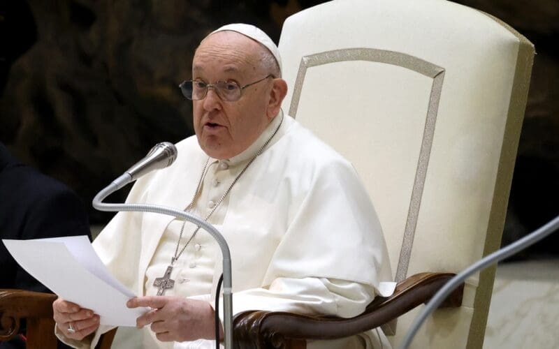 VATICAN CITY, VATICAN - 10 JANUARY 2024: Pope Francis reads during his weekly general audience in the Paul VI hall.