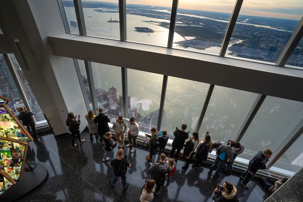NEW YORK - FEBRUARY, 2020 One World Observatory deck with people on the One World Trade Center (Freedom Tower) the tallest structure in New York City.By Shutterstock.com-pio3.