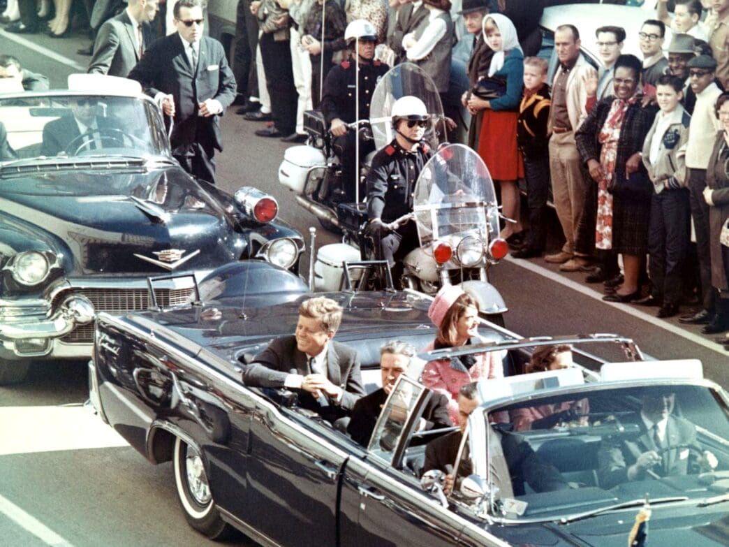 The Kennedys and the Connallys in the presidential limousine moments before the assassination in Dallas