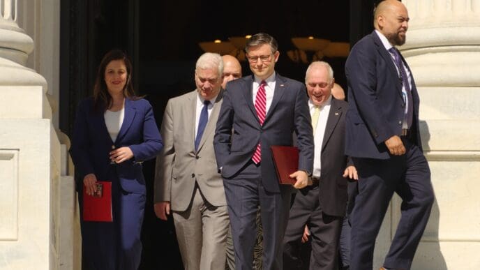 WASHINGTON, DC - May 16, 2024 House Speaker Mike Johnson (R-La.) walks out of the Capitol with the senior House leadership for a press conference.