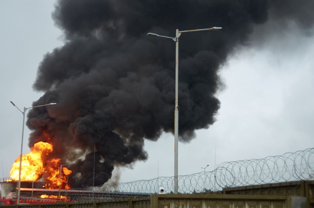 fire on oil station after rocket attack. By Shutterstock - Dmitriy Sidanchenko