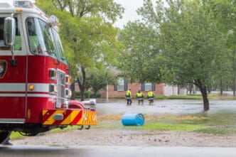Missouri City, Texas - August 29, 2017. The first responders from Missouri City Fire Station 4 inspect flooded houses in Sienna Plantation. By Shutterstock - Michelmond