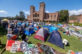 Pro-Palestinian protesters gathered at an encampment at the University of California, Los Angeles (UCLA), on April 26, 2024. By Shutterstock.com - Ringo Chiu