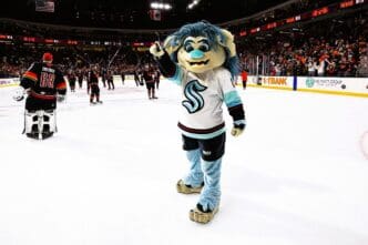 Seattle Kraken mascot Buoy at a Coachella Valley Firebirds game