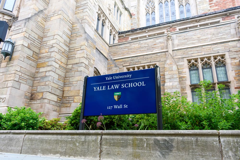 Yale University. Yale Law School sign and coat of arms at Sterling Law Building. New Haven, Connecticut. By Shutterstock.com - Michael Vi