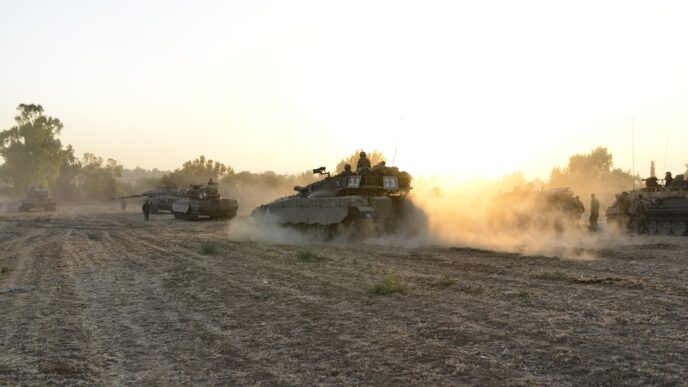 Gaza StripIsrael -July 7th - Israeli merkava tank on his way to the Gaza border in July 7th 2014 in the fields around Gaza Strip during their army service.