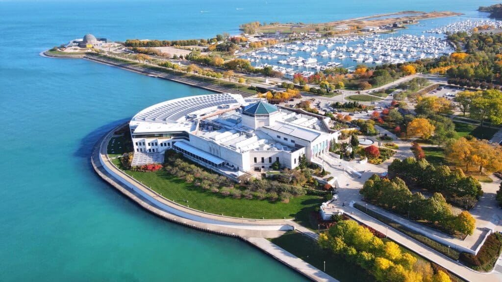 An aerial view of the Shedd Aquarium in Chicago on the shore of Lake Michigan during autumn.