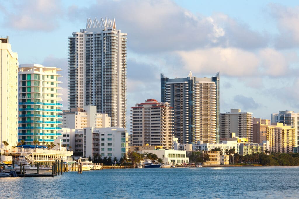 The densely packed skyline of high-rise hotels and residential buildings along the shoreline of North Beach and Mid Beach, Miami Beach.