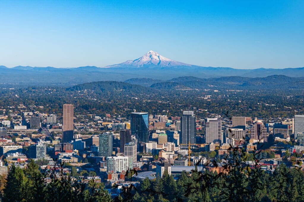 The Portland, Oregon, skyline on a clear day with the snow-capped Mt. Hood in the background.
