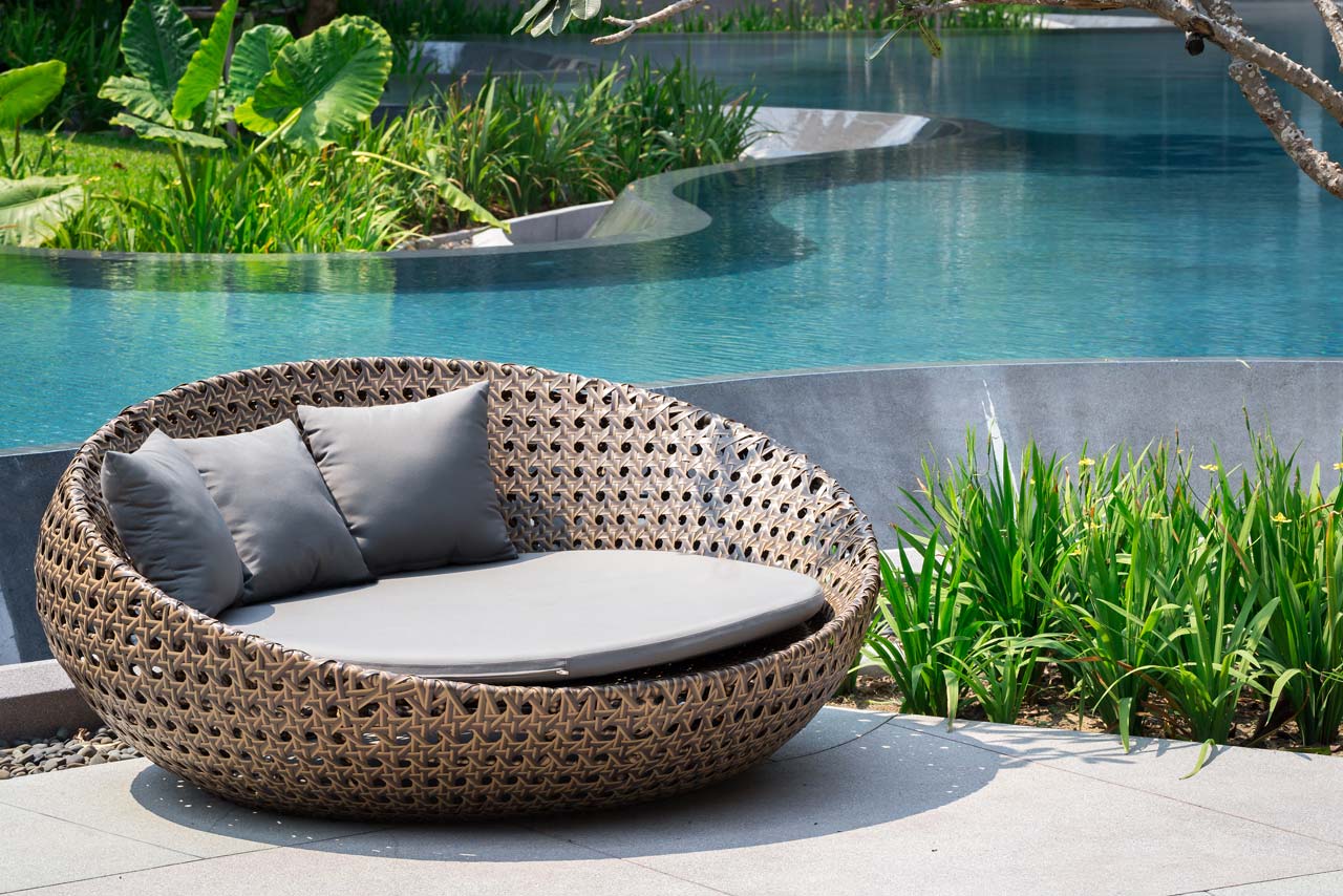 Relaxing Rattan Chair at Swimming Pool